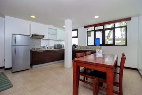 Superior Apartment, Courtyard View | Private kitchen | Full-size fridge, microwave, coffee/tea maker, electric kettle