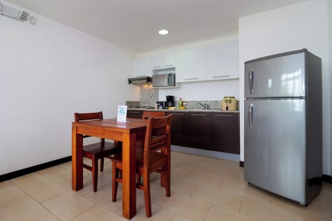 Deluxe Apartment, Private Bathroom, Sea View | Private kitchen | Full-size fridge, microwave, coffee/tea maker, electric kettle