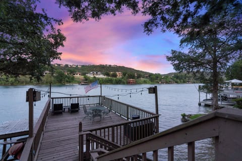 Elevate your lakeside experience with this stunning outdoor space, boasting a private boat dock and captivating lake vistas.