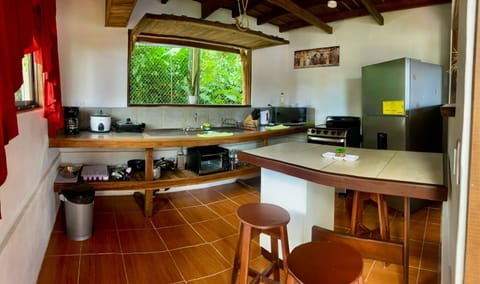 Classic Cabin | Private kitchen | Full-size fridge, microwave, electric kettle