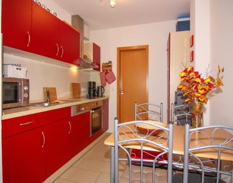Apartment | Private kitchen | Electric kettle, toaster, highchair