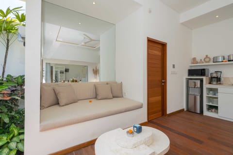 Basic Villa | Living area | 32-inch Smart TV with digital channels, streaming services