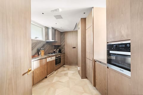 Gourmet Kitchen: Unleash your culinary skills with sleek appliances and stunning design!