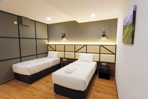 Standard Twin Room | Desk, laptop workspace, blackout drapes, free WiFi