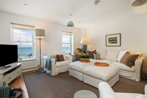 Seafront property, parking, close to town