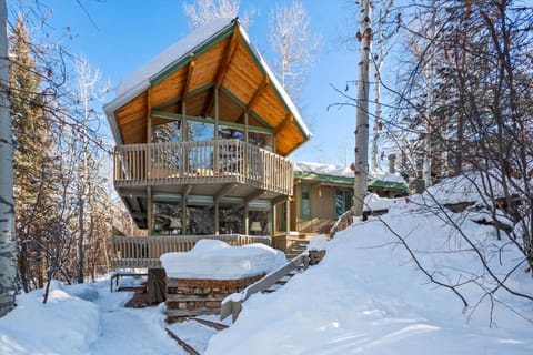 This home has a classic ski lodge feel and is surrounded by great outdoor space
