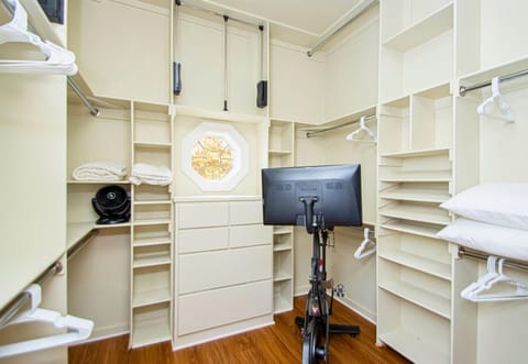 The walk-in closet offers plenty of storage, ensuring that you have ample space for all your belongings.