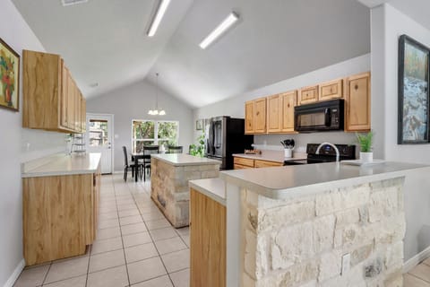 Behind the living room is the kitchen