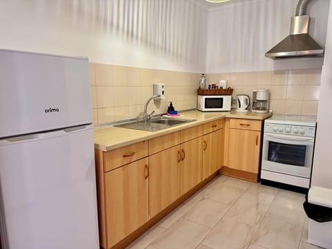 Classic Duplex, Partial Sea View | Private kitchen | Full-size fridge, microwave, oven, stovetop