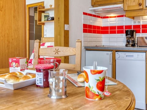 Food, Table, Furniture, Property, Countertop, Cabinetry, Tableware, Kitchen Appliance, Wood, Kitchen