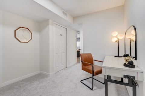 Enhance your stay with a dedicated workspace featuring a comfortable desk and chair, perfect for catching up on emails or planning your next adventure. Plus, with a convenient mirror nearby, you can effortlessly fix yourself up before heading out