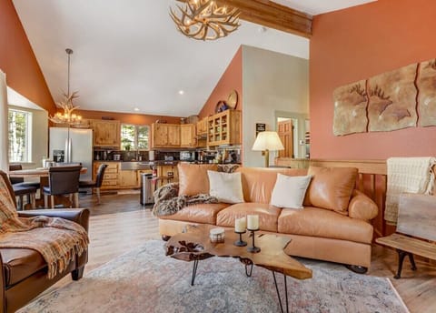 Here, the living room seamlessly blends with the kitchen and dining area. It's not just a space; it's where laughter echoes, stories are shared, and every moment feels like home.