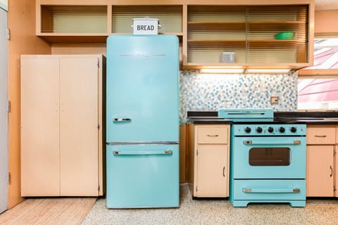 Main Level | Kitchen | New Retro Appliances |Retro Microwave | Coffee Bar | Dishwasher |Enjoy the charm of the 1950s with all the comforts of today’s appliances. We also offer cookbooks straight from the Era.
