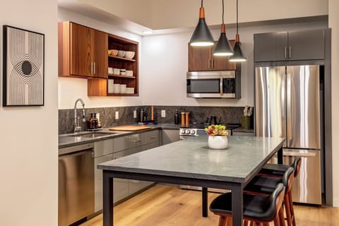 Deluxe Suite, 2 Bedrooms | Private kitchen | Full-size fridge, microwave, oven, stovetop