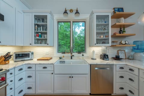 Wolf 6-burner gas range, dishwasher, and standard drip style coffee maker with coffee grinder