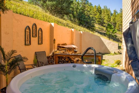 Secluded hot tub area is one of many outdoor spaces at the Creekside Cabins. A unique whole home rental or a separated 3/2 or 2/1 rental in downtown!