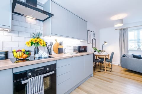 The open plan fully equipped kitchen has everything you need for a long or short stay in Crewe.