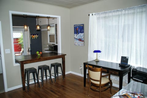 Office space for catching up, unique dining area between living and kitchen areas