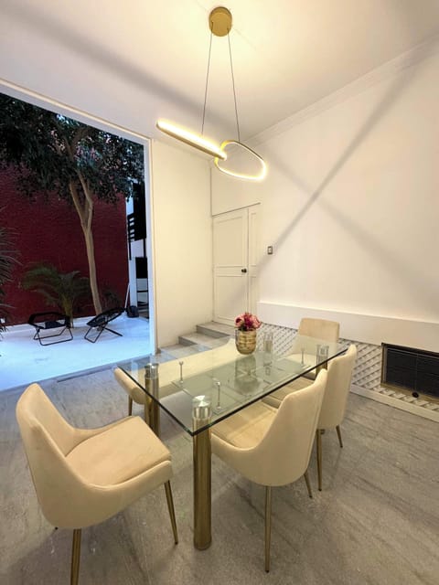 There's another table downstairs next to the patio courtyard