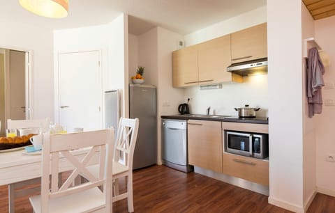 Prepare delicious meals for your friends and family in your personal kitchenette and enjoy your meals in the dining area with seating for your group.