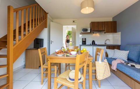 Prepare a meal in the equipped kitchen.