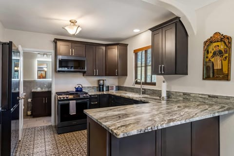 Suite, Multiple Beds, Non Smoking | Individually decorated, individually furnished, iron/ironing board