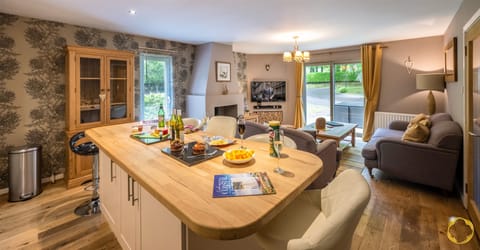 OPEN PLAN LIVING ROOM WITH WOODBURNING STOVE