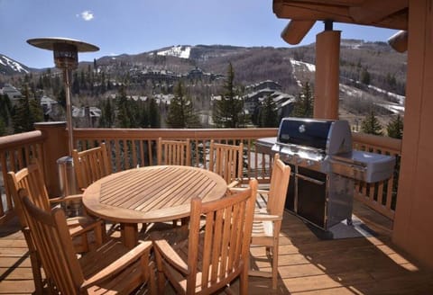 Enjoy breathtaking mountain views from the spacious deck, equipped with outdoor seating and a grill for al fresco dining.