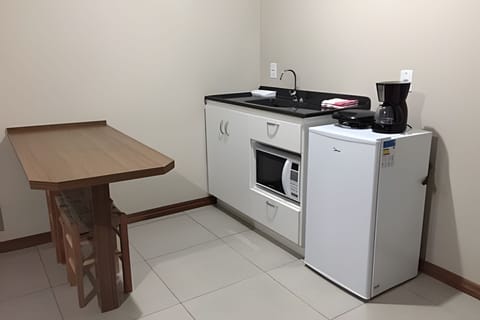 Apartment | Private kitchen | Mini-fridge, microwave, cookware/dishes/utensils