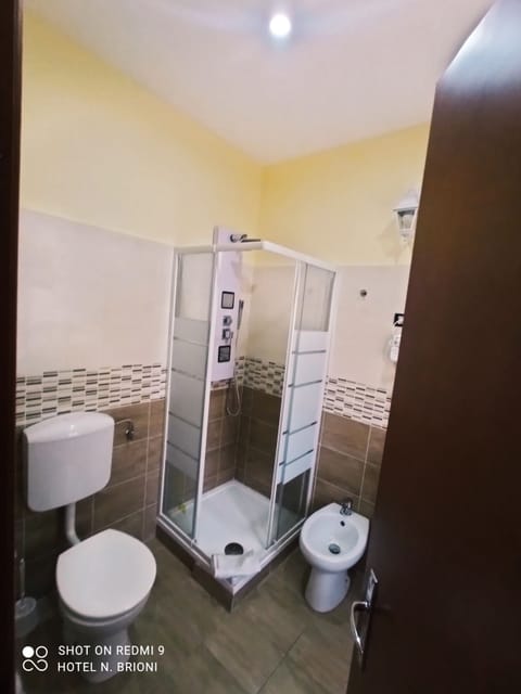 Deluxe Room, Balcony, City View | Bathroom | Shower, hair dryer, towels, soap