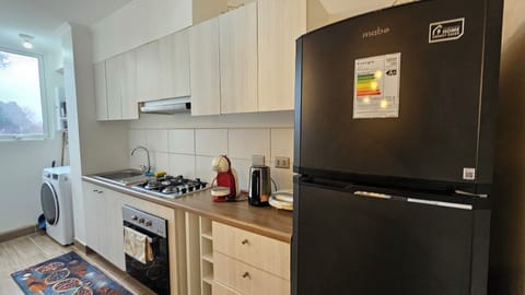 Family Apartment, City View | Private kitchen | Electric kettle