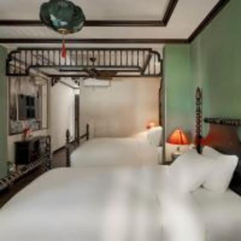 Deluxe Triple Indochine | Pillowtop beds, minibar, in-room safe, individually furnished