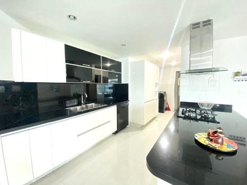 Basic Apartment | Private kitchen | Full-size fridge, microwave, cookware/dishes/utensils