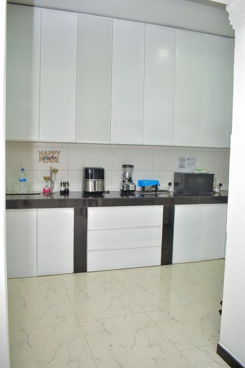 Villa | Private kitchen | Fridge, microwave, oven, stovetop