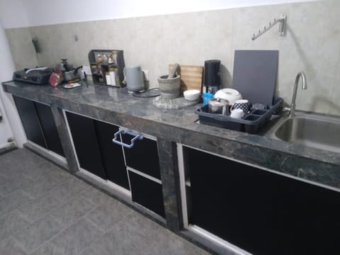 Villa | Private kitchen | Fridge, microwave, oven, stovetop