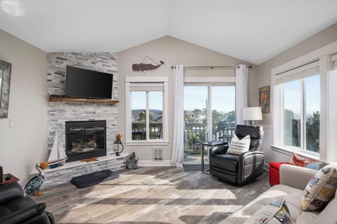 Cozy living room with ocean views and natural light
