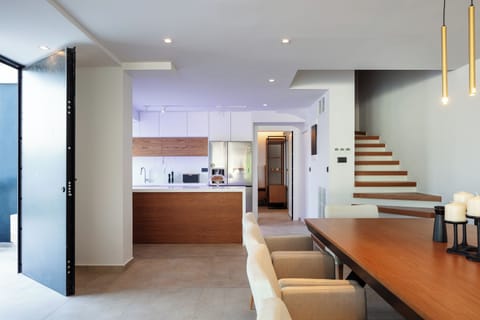 The elegant 10-seat dining table awaits, inviting you to create unforgettable meals and moments with your loved ones.