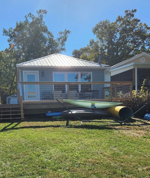 Front deck facing the water. Easy water access for paddle boards and kayaks.