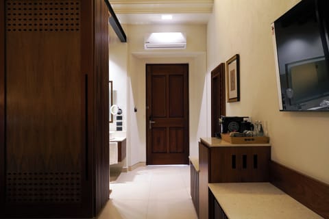 Junior Suite, City View | Premium bedding, minibar, in-room safe, desk