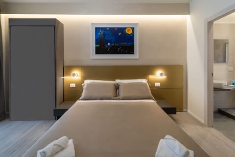 Deluxe Triple Room, Private Bathroom, Sea View | Premium bedding, minibar, individually decorated, individually furnished