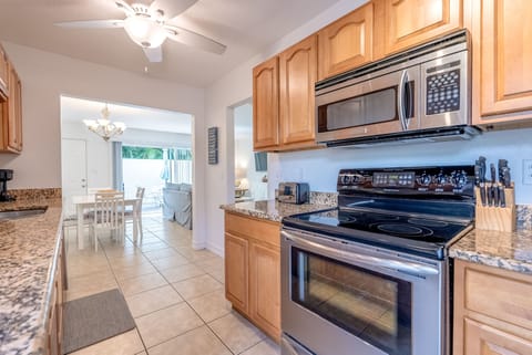 Standard Suite, Non Smoking, Patio | Private kitchen | Full-size fridge, microwave, dishwasher, cookware/dishes/utensils