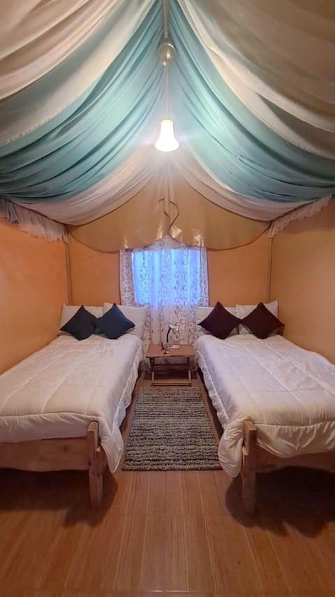 Luxury Tent, 2 Twin Beds, Private Bathroom, Garden View | Down comforters, desk, laptop workspace, bed sheets