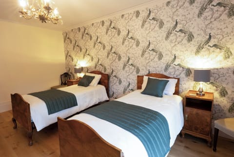 Deluxe Twin Room, Garden View | In-room safe, iron/ironing board, free WiFi