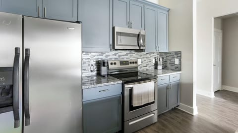 Apartment, 2 Bedrooms | Private kitchen | Full-size fridge, oven, stovetop, dishwasher