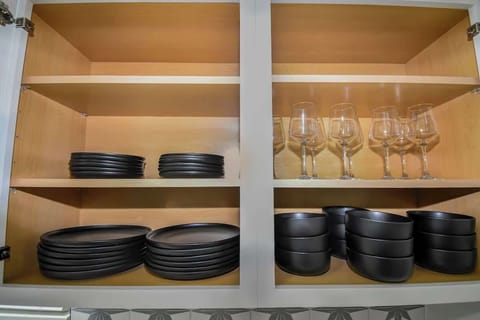 Enjoy cooking with provided dishes and glassware.