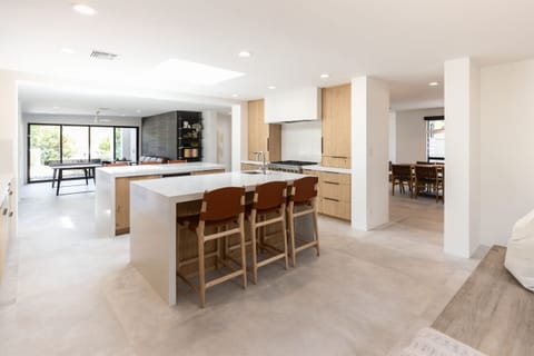 Two large kitchen islands make prepping meals easy.
