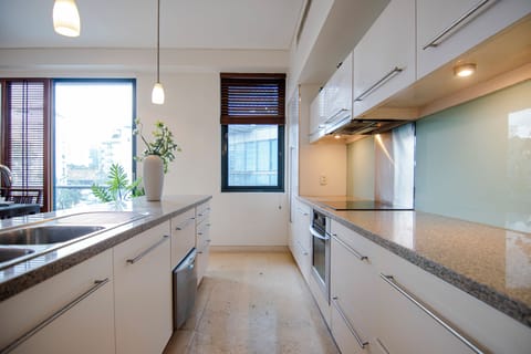 Family Suite, 2 Bedrooms, Balcony, City View | Private kitchen | Fridge, microwave, oven, stovetop