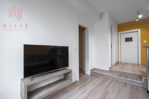 Standard Apartment | Living area | Flat-screen TV