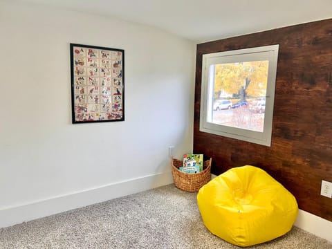 Family-friendly play space with books, board games, and toys!