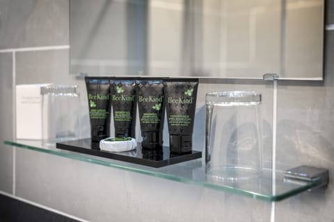 Combined shower/tub, hair dryer, towels, soap